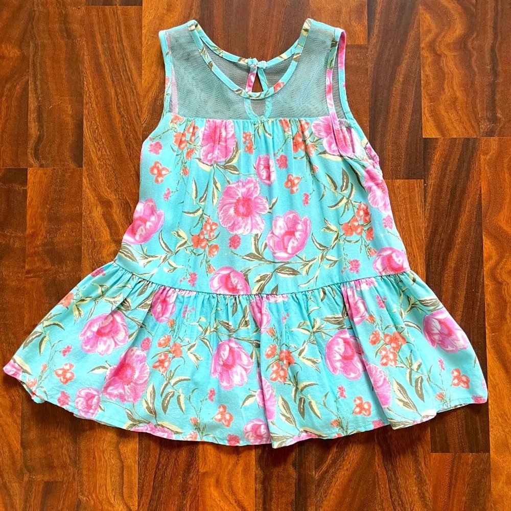 Beautiful Sleeveless Floral Swing Top